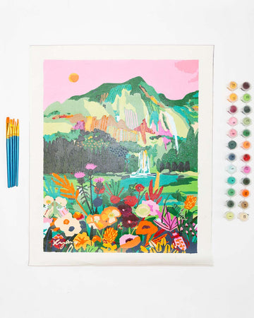 painted colorful mountain and wildflower paint by numbers with pots of paint and paintbrushes