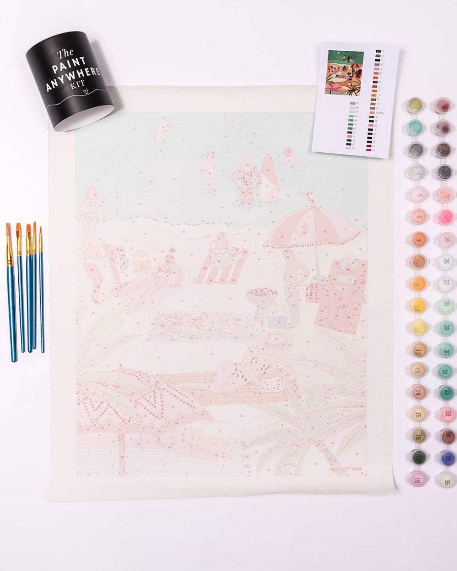 unpainted paint by numbers kit with a beach scene and includes 5 brushes and 24 pots of paint