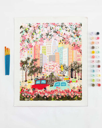 painted paint by numbers kit withpeach city image, paint brushes and pots of paint