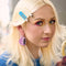 model wearing cream and blue bubble hair clips