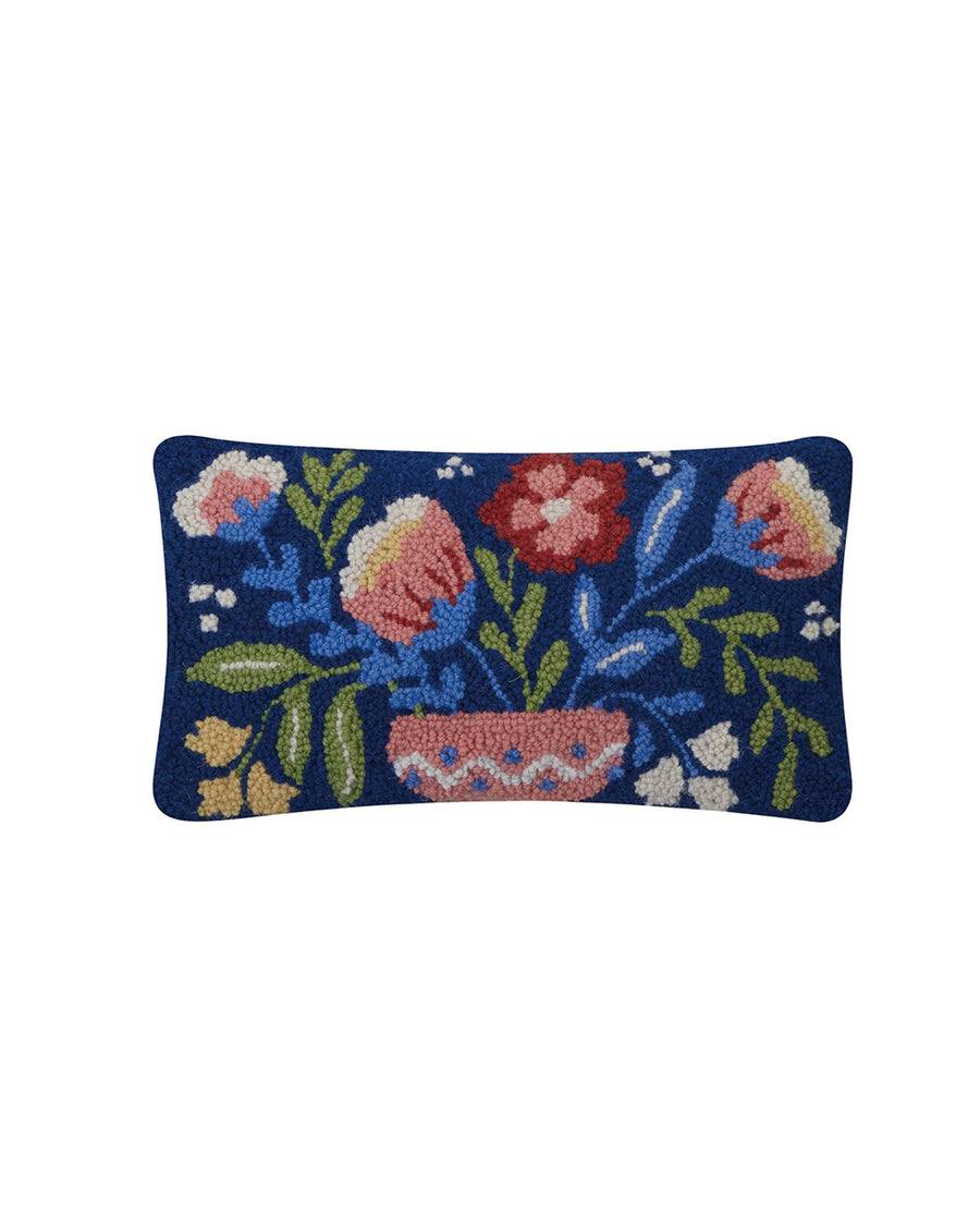 navy blue lumbar pillow with colorful flowers in a vase print