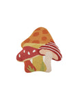 mushroom trio throw pillow with orange polka dot, red and white stripe and red and white mushrooms