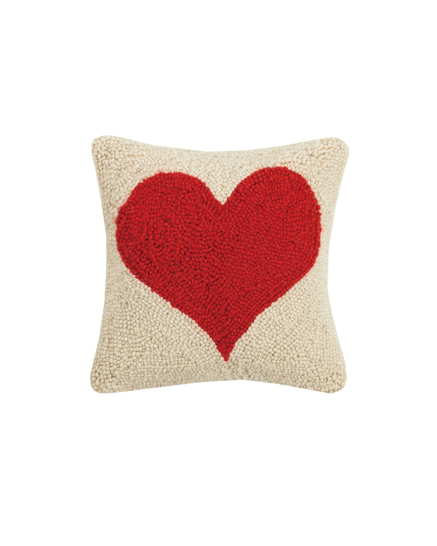 square throw pillow with cream ground and red heart