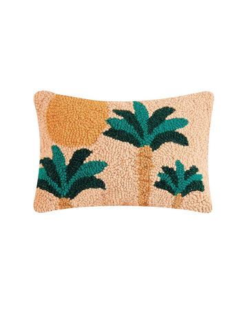 light peach throw pillow with sun and palm tree print