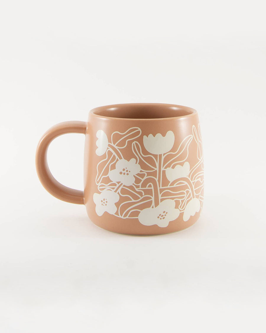 peach take good care of yourself mug with white flower print