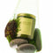 mossy stone scented standard candle in a mesh bag with moss and stones