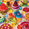completed puzzle of  'had me at jello' 1000 piece puzzle with various colorful jello desserts on a table