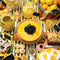 1000 piece puzzle with lemon inspired pastries and desserts on a striped tablecloth