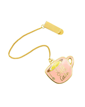 enamel chained bookmark with pink 'self-care' cup and gold clip