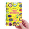model holding 'my super special collection of fruit stickers' journal book