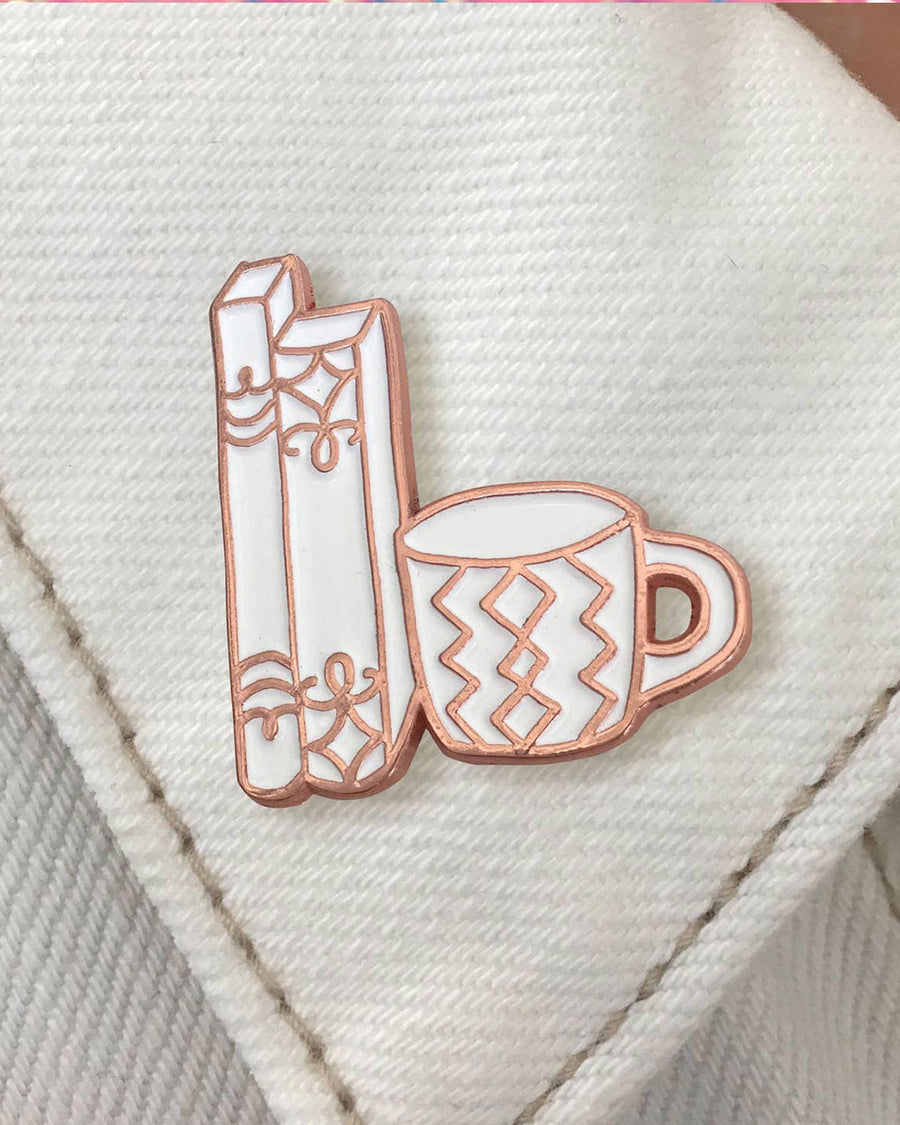 rose gold and white hand drawn style book and mug on collar