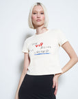 model wearing cream cropped tee with 'the VIP room is closed'