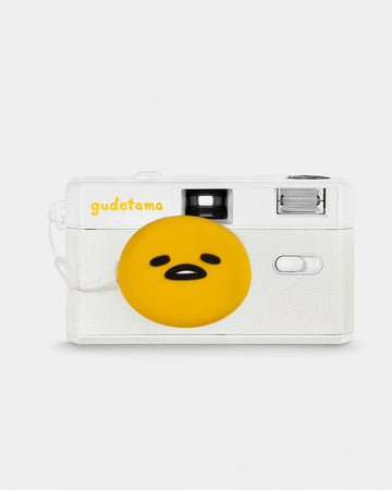 white gudetama 35mm camera with yellow gudetama face cover