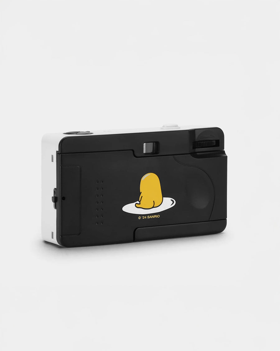 back view of white gudetama 35mm camera