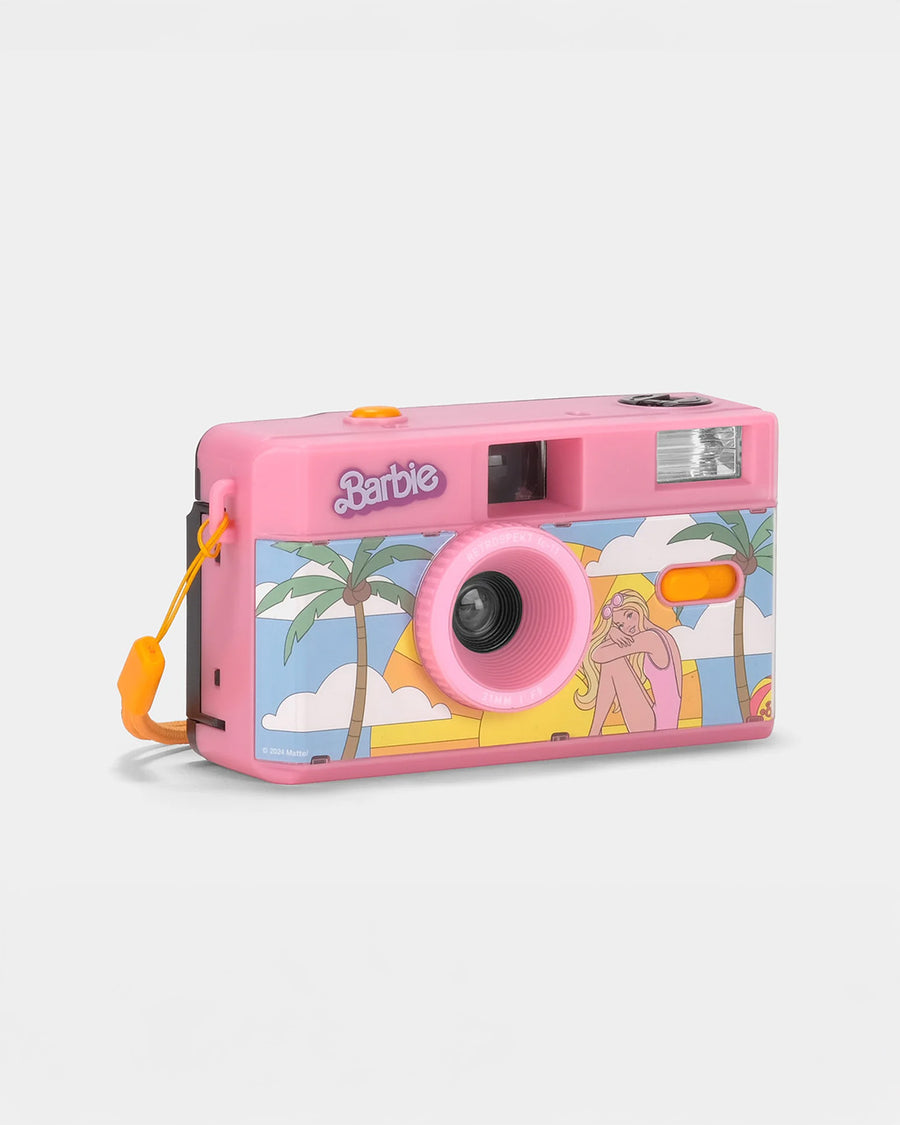 side view of pink 35mm camera with retro malibu barbie print