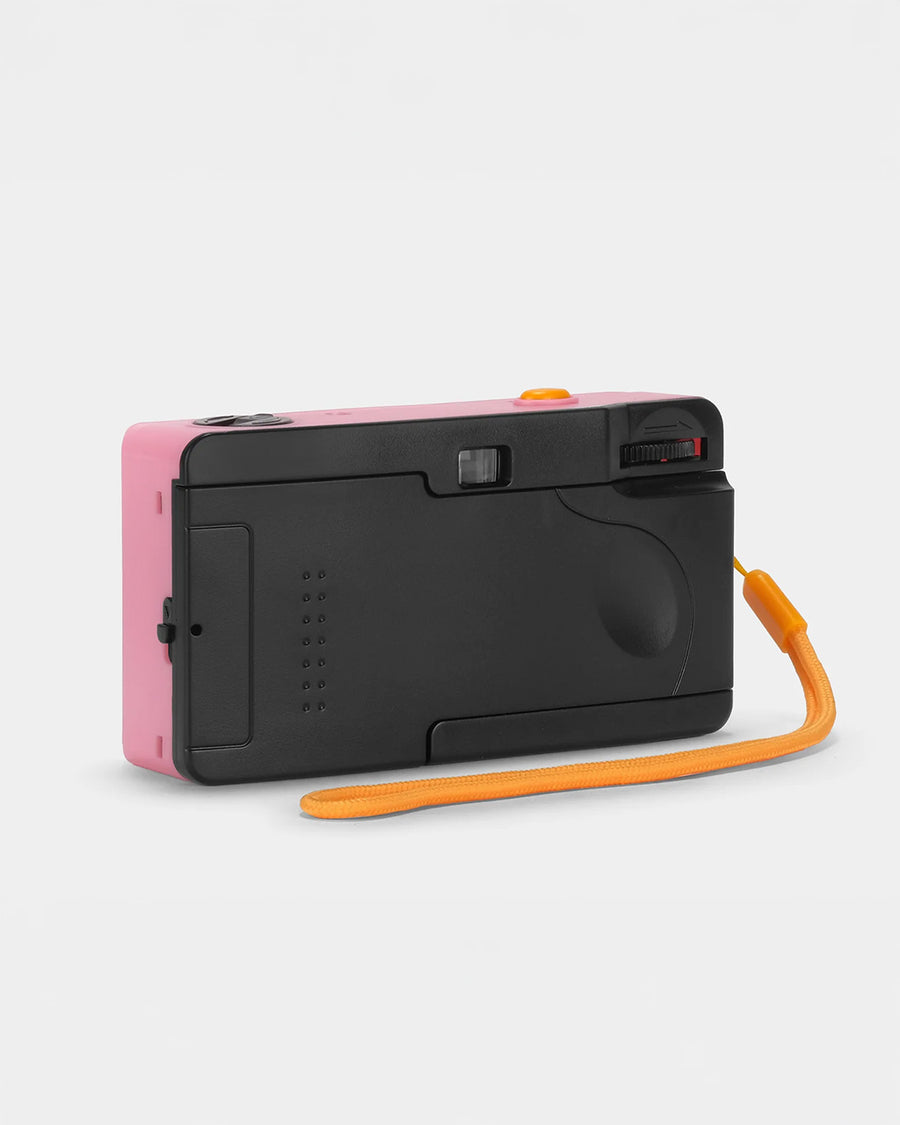 back view of pink 35mm camera with retro malibu barbie print