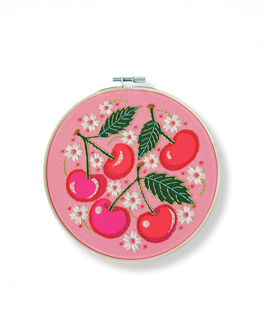pink embroidery kit with all over cherry and white flowers