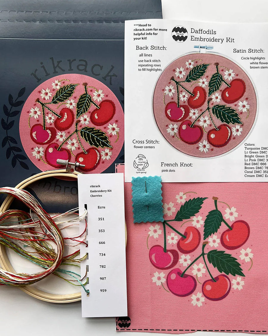 pink embroidery kit with all over cherry and white flowers with ring, thread, pre-printed fabric and instructions 