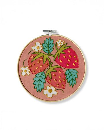 pink embroidery kit with all over strawberry and strawberry leaves