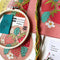 pink embroidery kit with all over strawberry and strawberry leaves with ring, thread, pre-printed fabric and instructions 