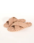 cream, brown and tan woven criss-cross sandals