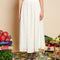 model wearing white lace midi skirt