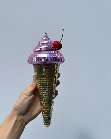 pink disco ice cream cone with cherry