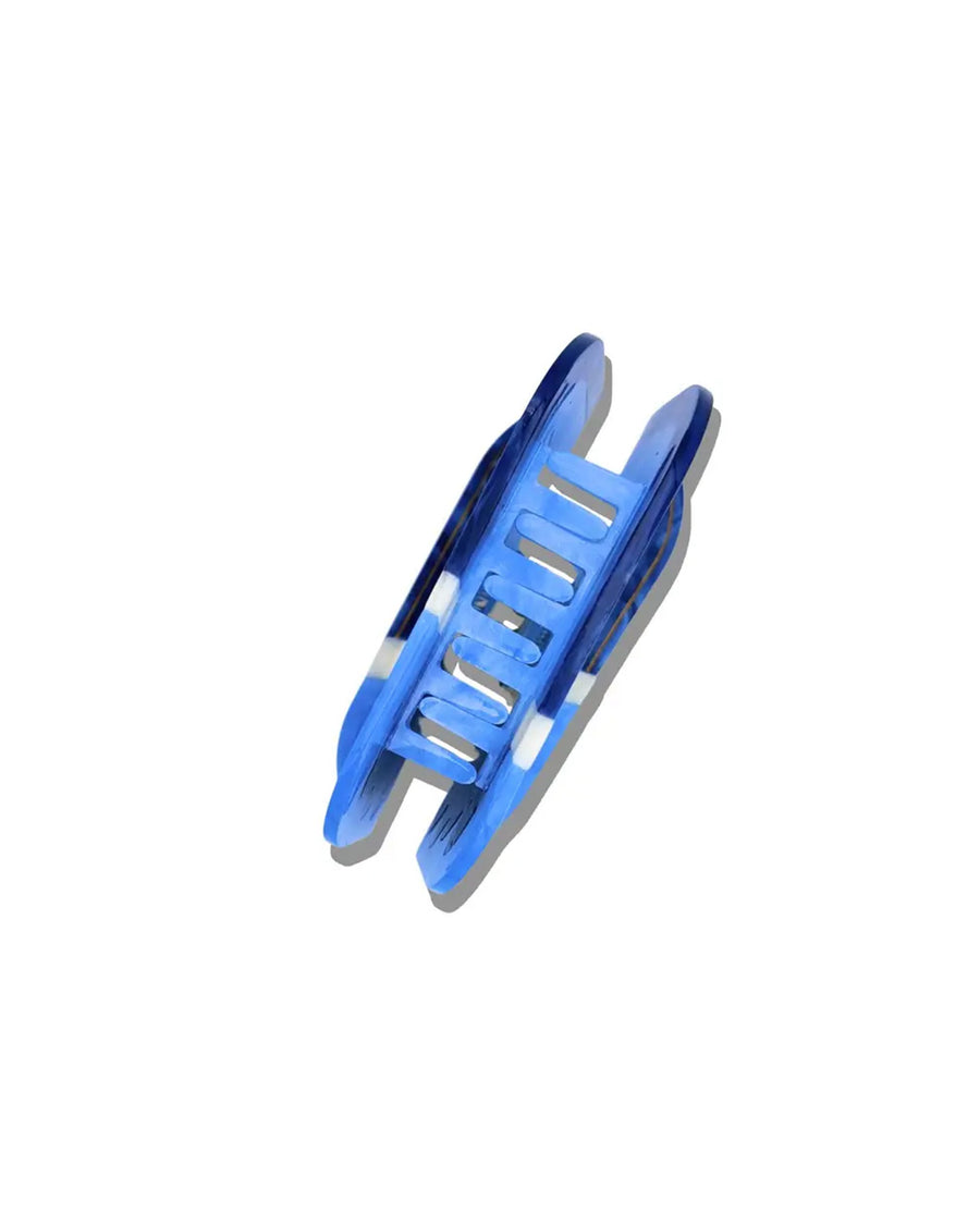 teeth on blue sardine can hair claw