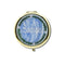blue and gold pill compact with a cross-stitch DRUGS and vine border