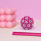various shades of pink mini magnet fidget toy in a sphere