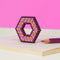 various shades of purple and pink mini magnet fidget toy in a hexagon design