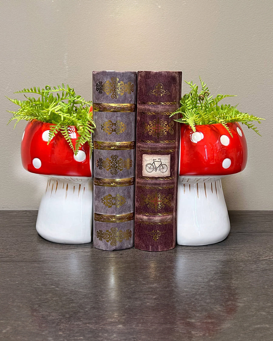 red and white mushroom bookend planters in a set of 2