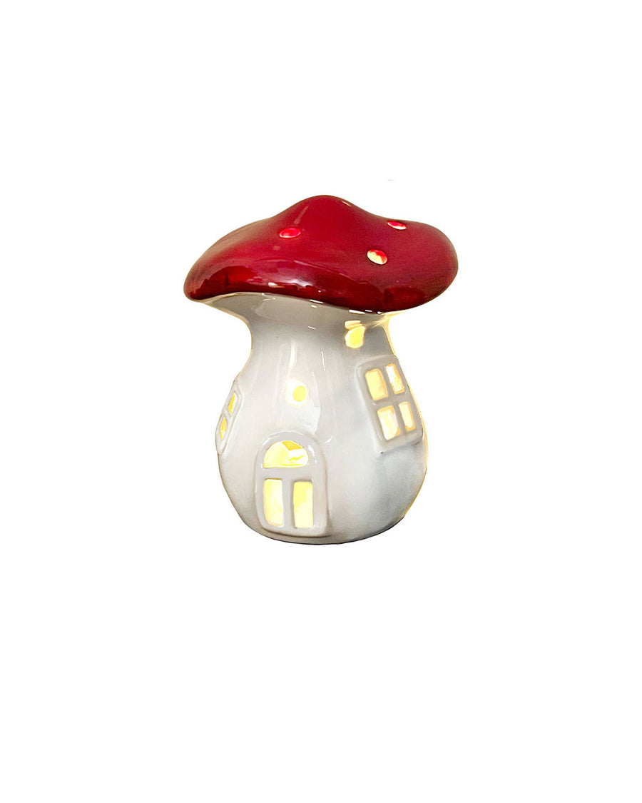 red and white mushroom cottage luminary