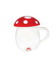 white mug with red and white mushroom top