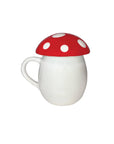 backview of white mug with red and white mushroom top