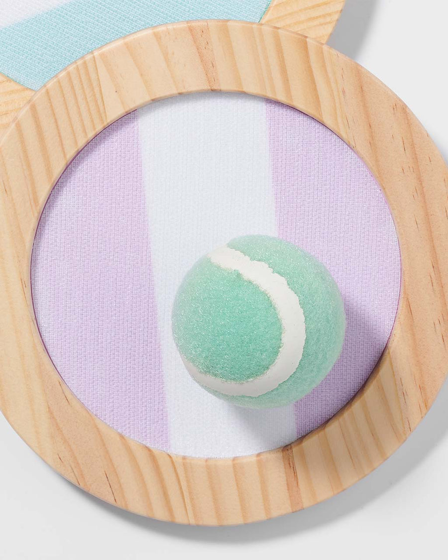 up close of purple and white and blue and white stripe catch ball set with mint colored velcro ball