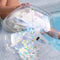 gold, mint, and lavender confetti inflatable beach ball poolside