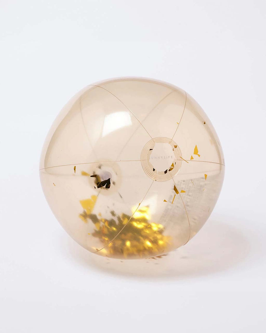 cream clear beach ball with gold flakes inside