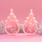pink pastel sunglasses with pink lens and pink tree with pom details on top with silver tinsel