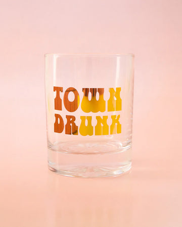 13 oz glass with gold foil 'town drunk' across the front