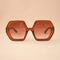 brown 70's inspired hexagon shaped sunglasses