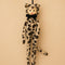cute plush dressed as a leopard and has a vintage circle face