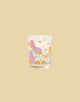 glass candle with vibrant abstract floral print