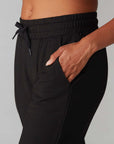 up close of model wearing black jogger pants
