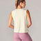 back view of model wearing sand active tank with hi-lo hem and muscle tank sleeves