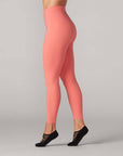 side view of model wearing poppy high waisted 7/5 in. active leggings