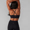 back view of model wearing black sports bra