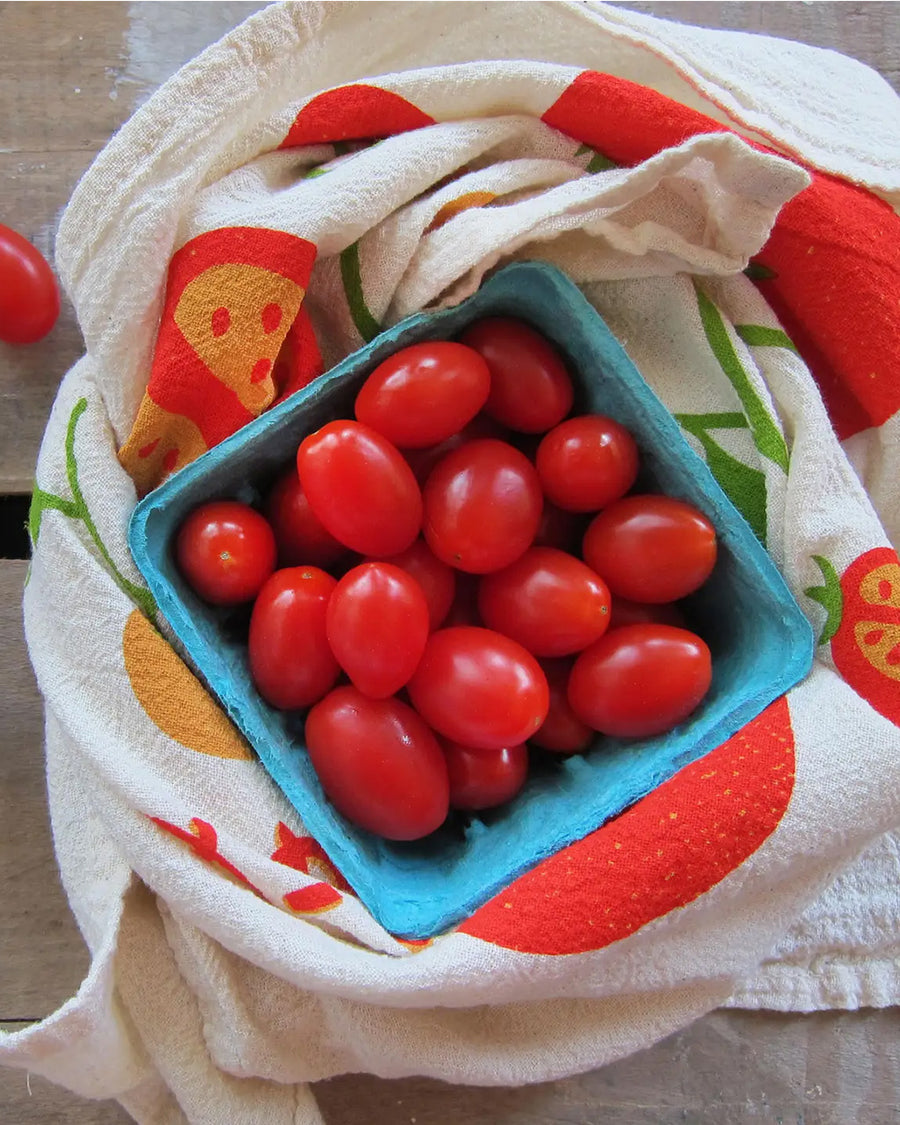 cherry tomatoes wrapped around tomato tea towel