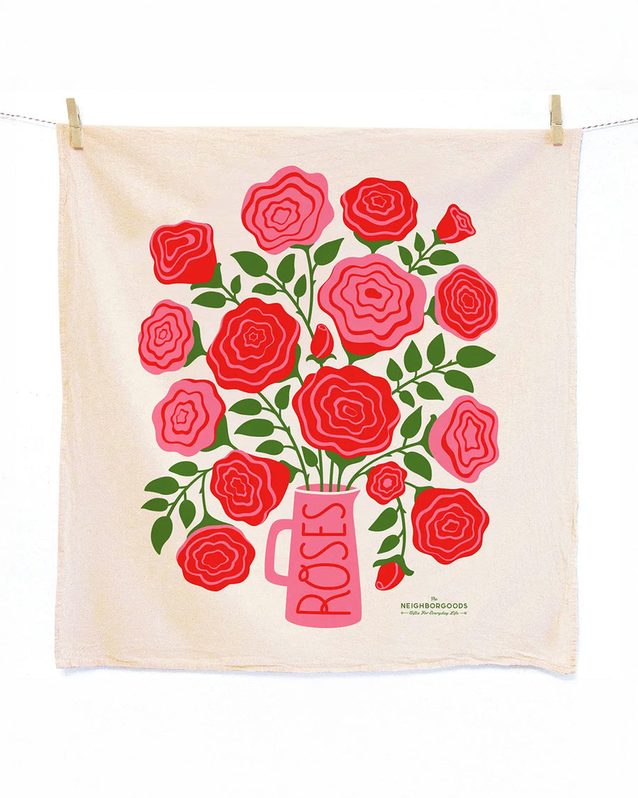 tea towel with all over rose print and a vase that says roses