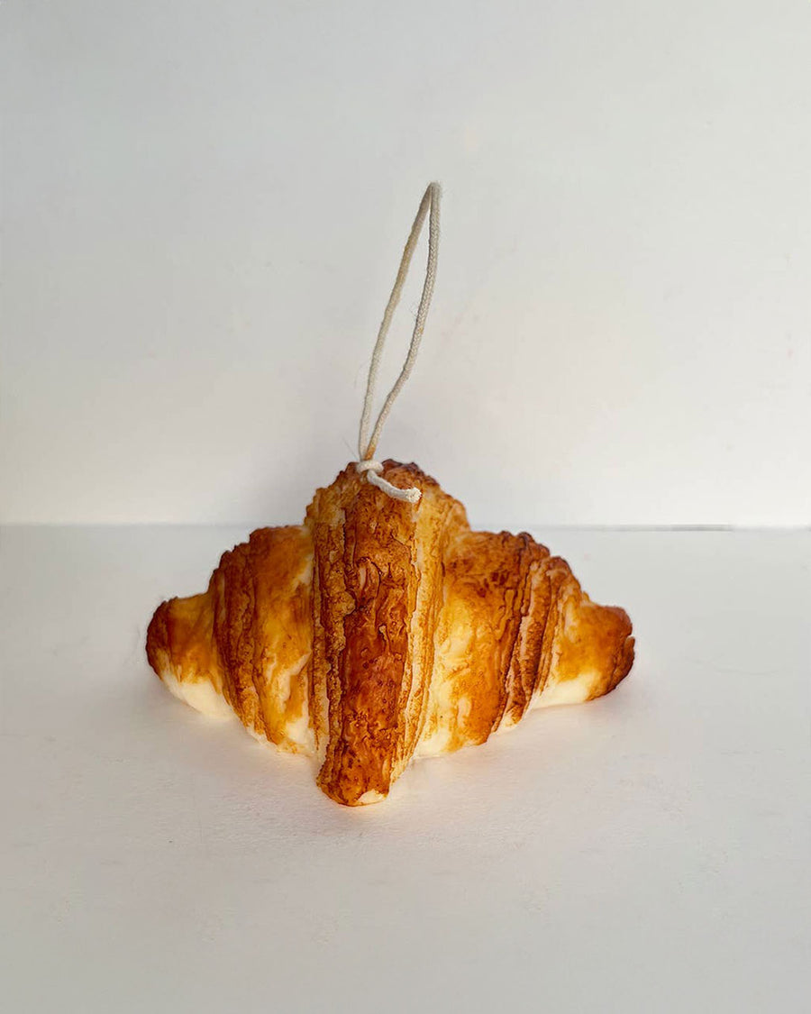 realistic croissant candle 